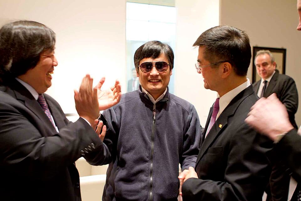 U.S. Ambassador to China Gary Locke, right; U.S. State Department Legal Adviser Harold Koh, left; with Chen Guangcheng, center; at the U.S. Embassy in Beijing, China, on May 1, 2012. [State Department photo/ Public Domain] Date 1 May 2012, 14:56